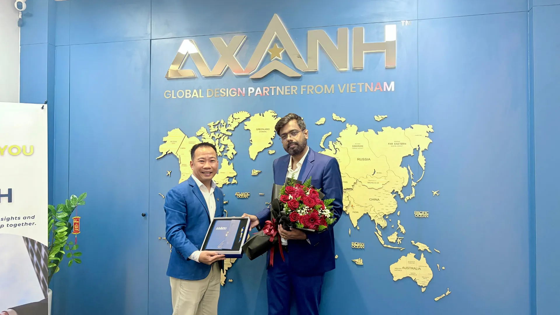 AXANH and Pinnacle Infotech representatives together after an office meeting