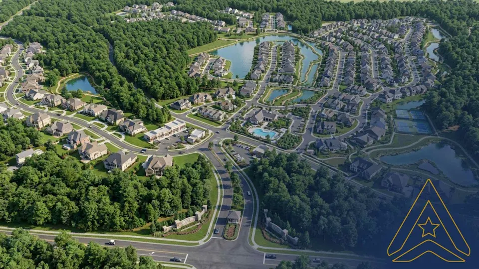 AXANH Projects: Aerial view of a planned community with houses, winding roads, greenery, ponds, and a gated entrance.