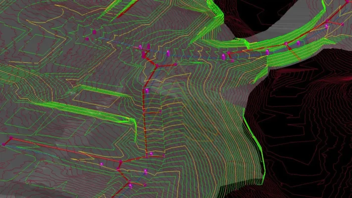 Digital terrain model showing colorful contour lines, green edges, and highlighted elevation pathways.