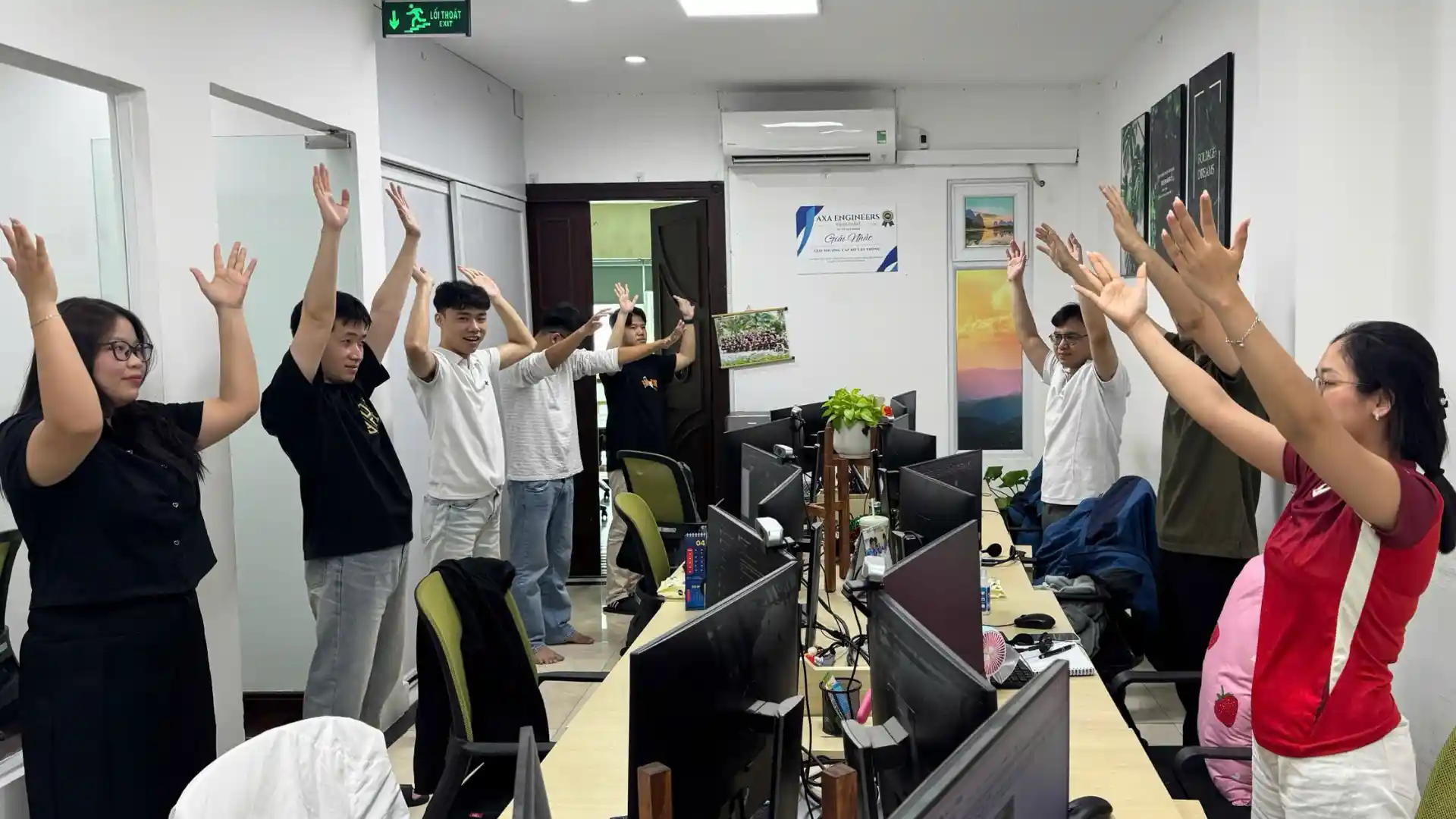 AXANH team members taking an active five-minute break