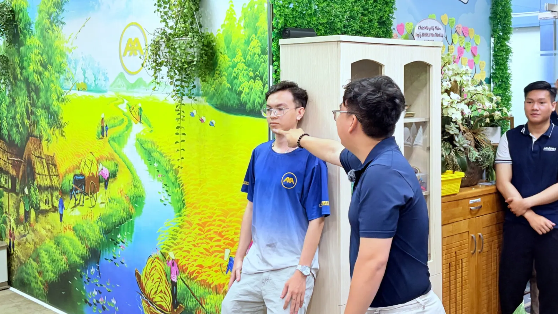 AXANH team members practising gentle movements with expert guidance