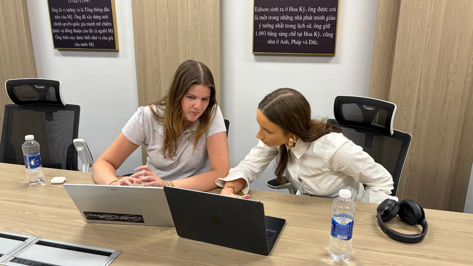 International interns at AXANH discussing their research