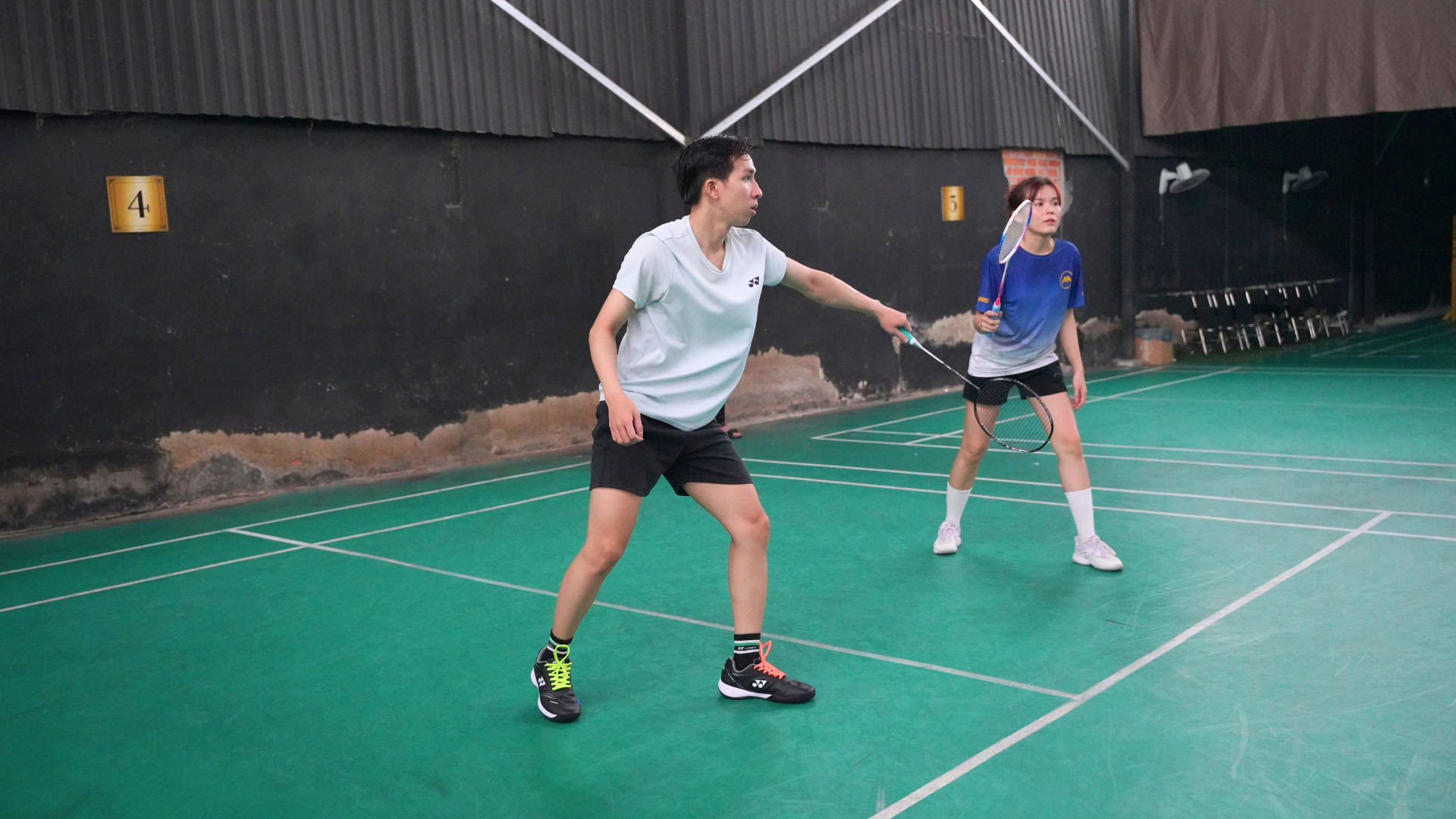Badminton match at AXANH Sports Day 2026